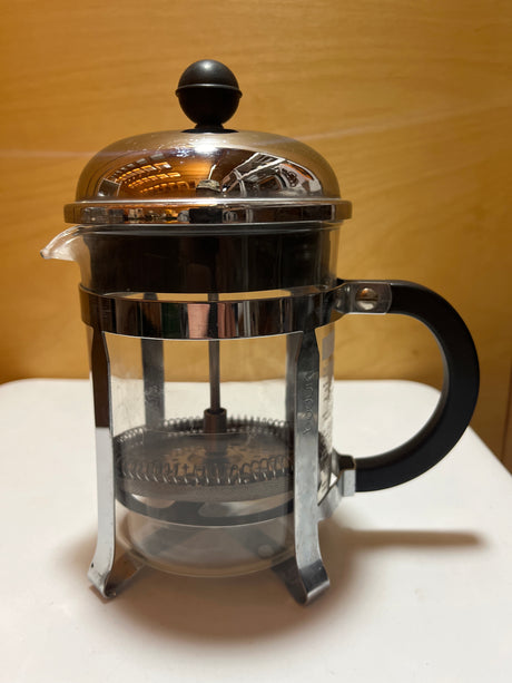 Bodum 4-cup French press designed for brewing small batches of strong coffee, featuring a sleek, compact build ideal for personal use.