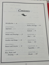 "Justin Wilson's Homegrown Louisiana Cookin': Over 300 New Recipes for Real Home Cookin'" by Justin Wilson (1990)