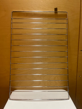 Stainless steel wire oven rack insert showcasing a durable, grid-like structure designed for optimal heat distribution and support during cooking.