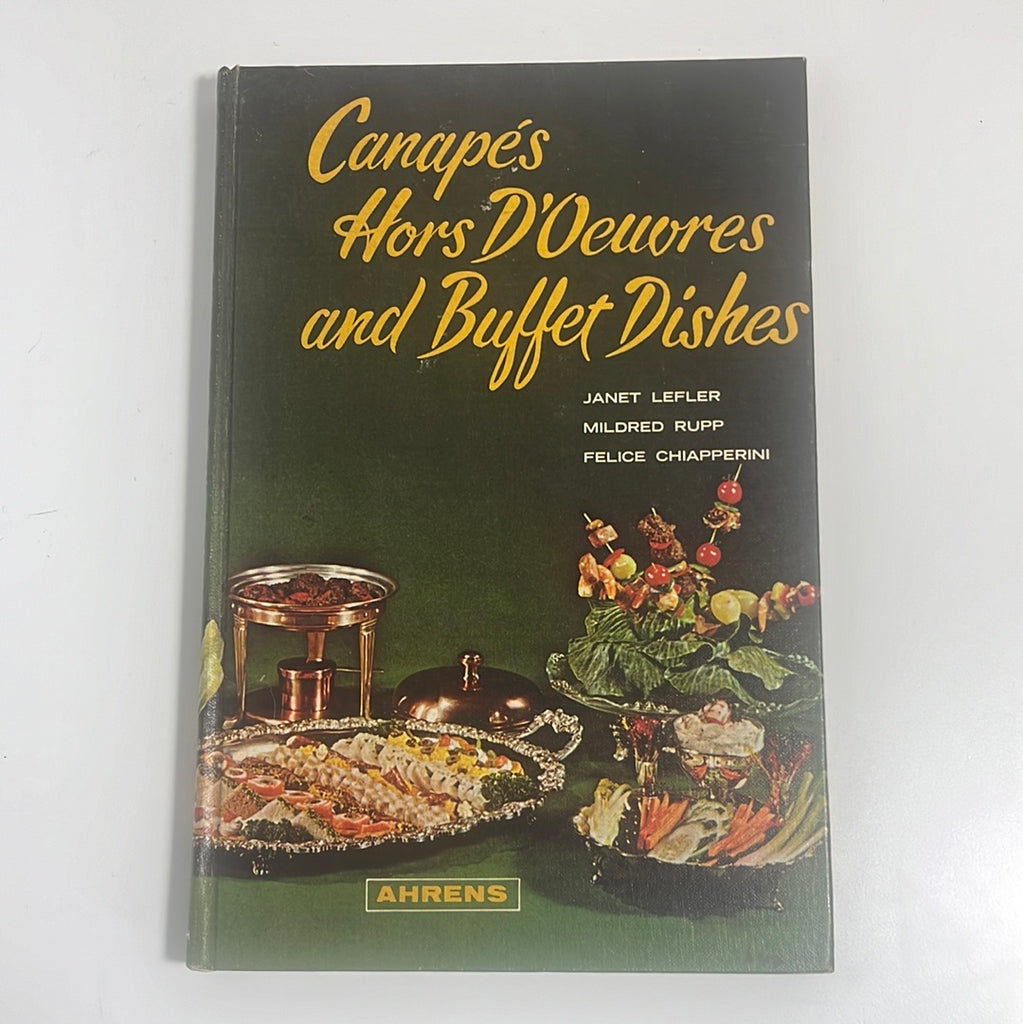 A book cover for Canapés, Hors D'oeuvres, and Buffet Dishes. From Spoons Kitchen Exchange.