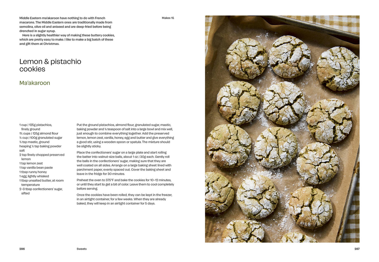 Boustany cookbook spread featuring lemon and pistachio cookies recipe; cookies shown on baking tray, highlighting Palestinian cuisine by Sami Tamimi, focusing on vegan and vegetarian dishes.