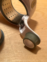 Rotary grater with two drums - Zyliss featuring stainless steel drums and a plastic handle, designed for effortless cheese grating.