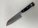 Simply Calphalon 7” Santoku knife designed for chopping crispy produce and fresh herbs, featuring a broad, sharp blade suitable for various kitchen tasks.