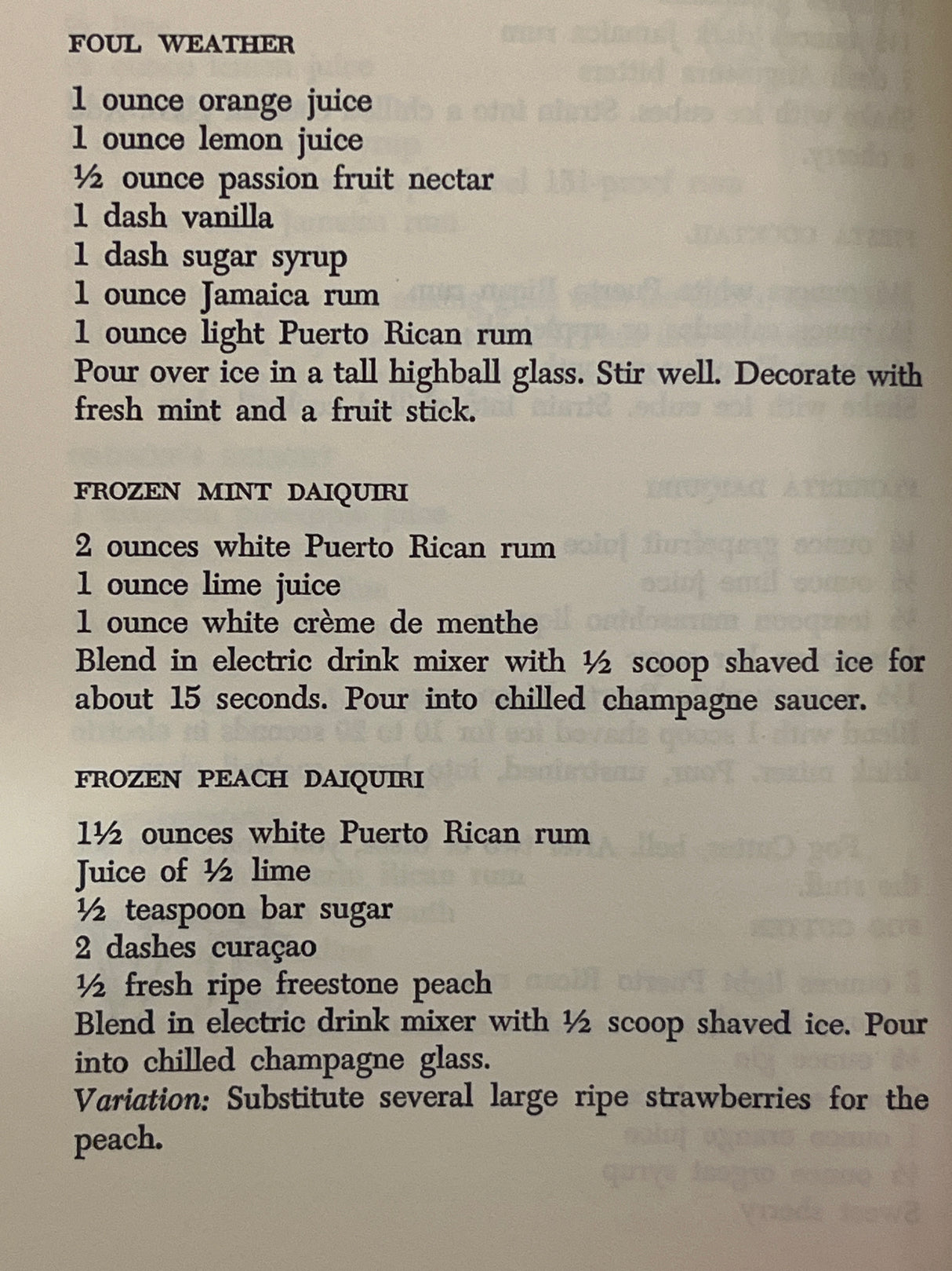 Trader Vic’s Bartender’s Guide (Revised 1972) features vintage cocktail recipes, including Foul Weather, Frozen Mint Daiquiri, and Frozen Peach Daiquiri, with minor wear on corners.