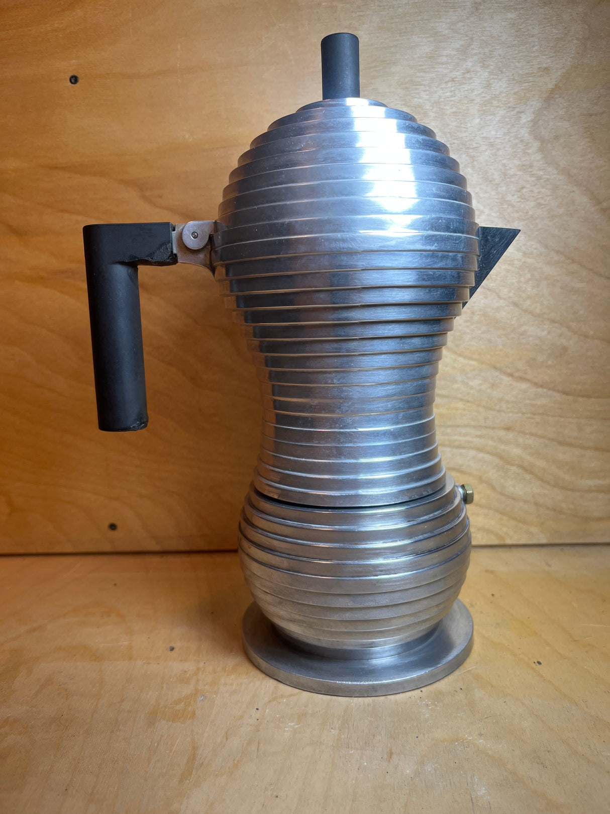 RARE Alessi Pulcina 6-cup moka pot stovetop espresso maker, featuring stacked metal discs and a unique beak-shaped spout for perfect espresso brewing.