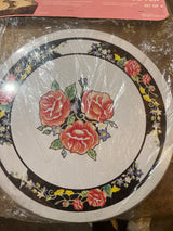 Rosy decorative burner cover set of 4 featuring red roses, usable as trivets or spoon rests; keeps burners clean, dishwasher safe, remove when stove is in use.