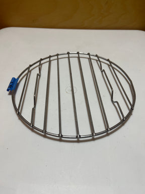 Small circular wire cooling rack with raised feet, versatile for use as a tray or cooling rack for pots and pans.