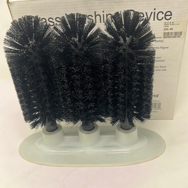 Triple Brush Glass Washing Device with three black bristles on white stand in front of product box. From Spoons Kitchen Exchange.