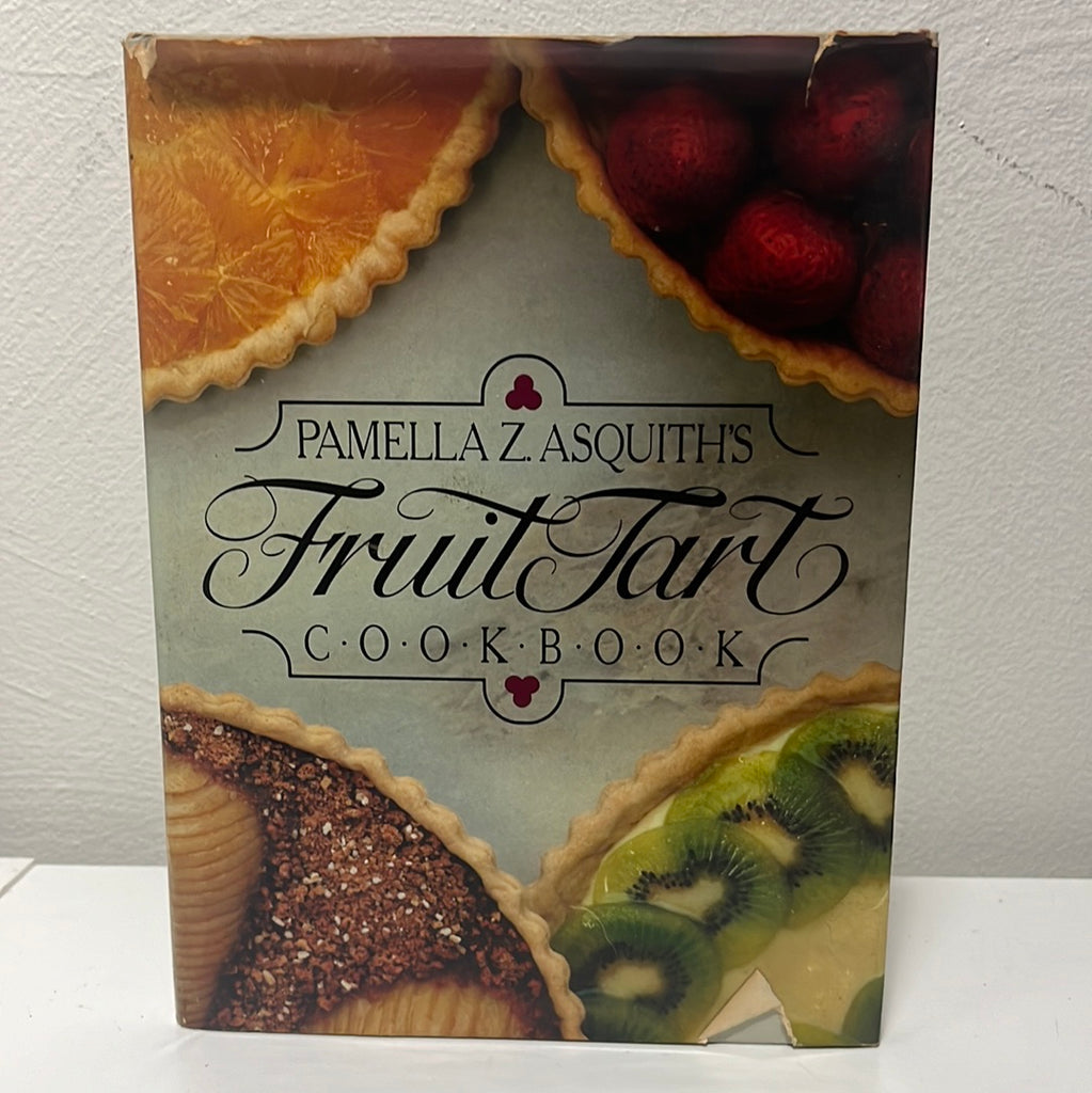 Pamella Z. Asquith's Fruit Tart Cookbook: front cover image with a close-up of four delicious fruit tarts with a flaky crust, pastry cream, and fresh seasonal fruits. From Spoons Kitchen Exchange.