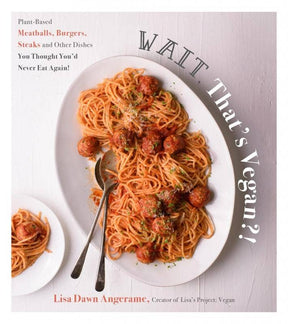 Cover of Wait, That's Vegan?!, featuring spaghetti with plant-based meatballs, herbs, vegan cheese, and the author Lisa Dawn Angerame’s name.