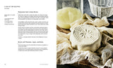 The Vegan Creamery cookbook spread, featuring vegan ricotta recipes, with a molded ricotta wheel on cheesecloth, emphasizing plant-based dairy alternatives.