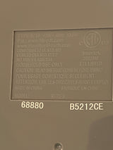 Automatic ice cream maker - Hamilton Beach 68880 compliance plate showing model, type IC10, electrical rating, certifications, and manufacturer details for household use only.