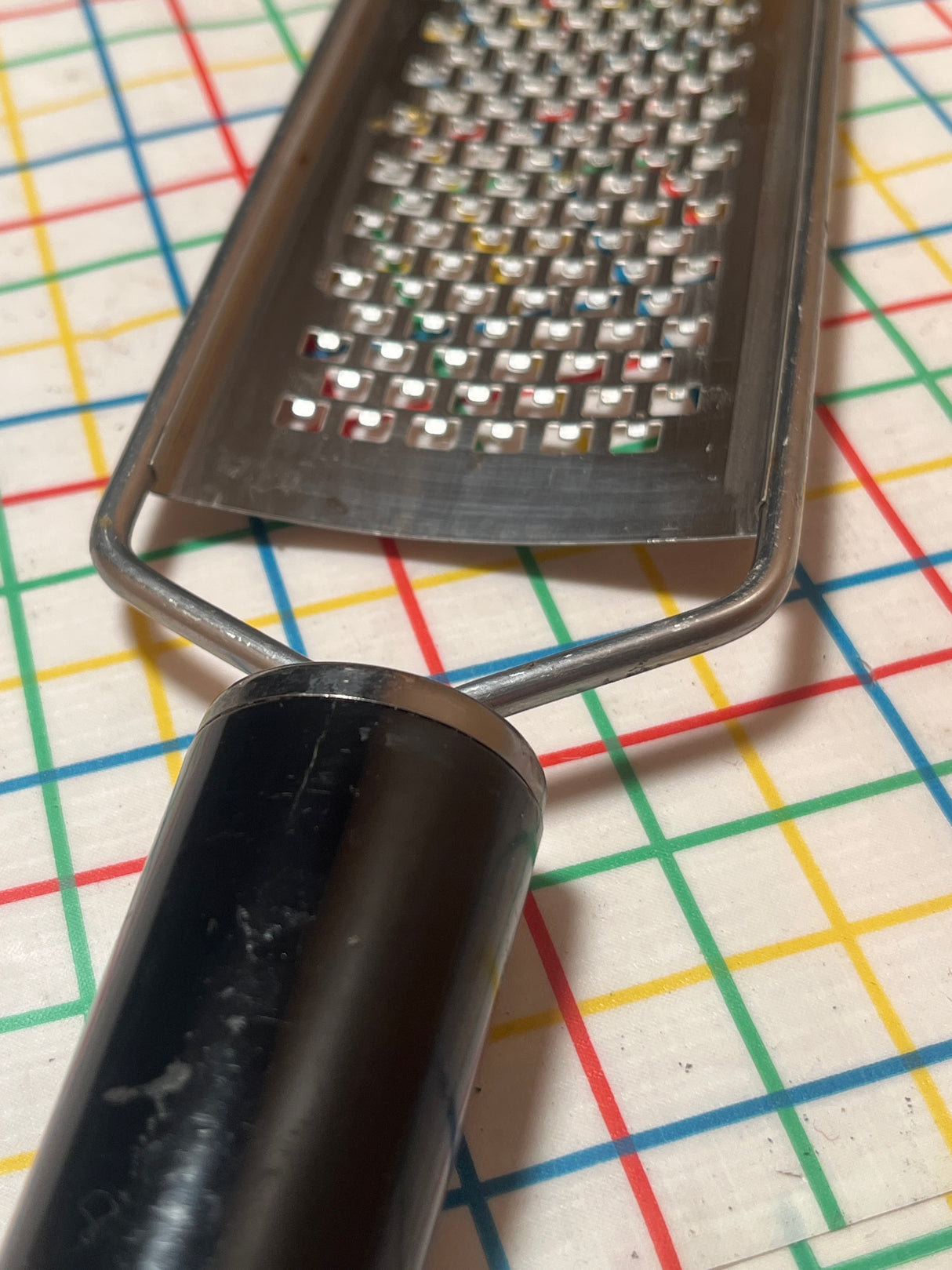 Medium etched grater - stainless steel with plastic handle- Farberware Professional