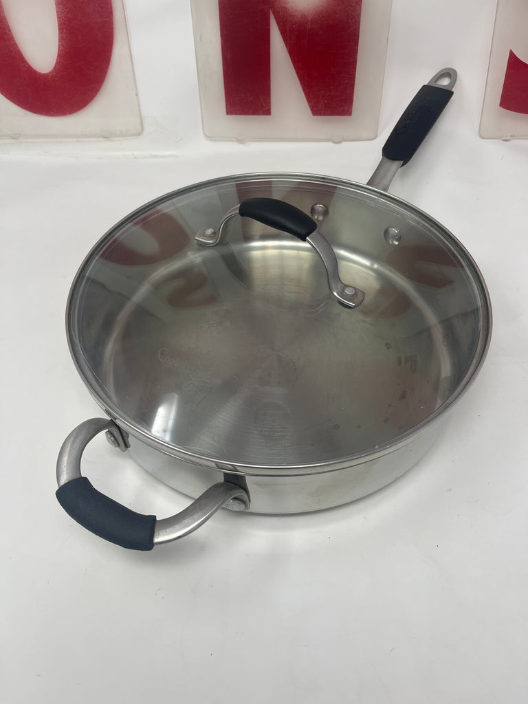 Calphalon 5003 3qt sauté pan with lid featuring silicone handles, ideal for kitchenware and indoor cooking.