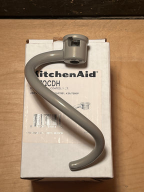 Dough hook attachment - KitchenAid stand mixer 7 QT Models KSM7581, KSM7586P, shown new in box, featuring an S-shaped, coated design for kneading.