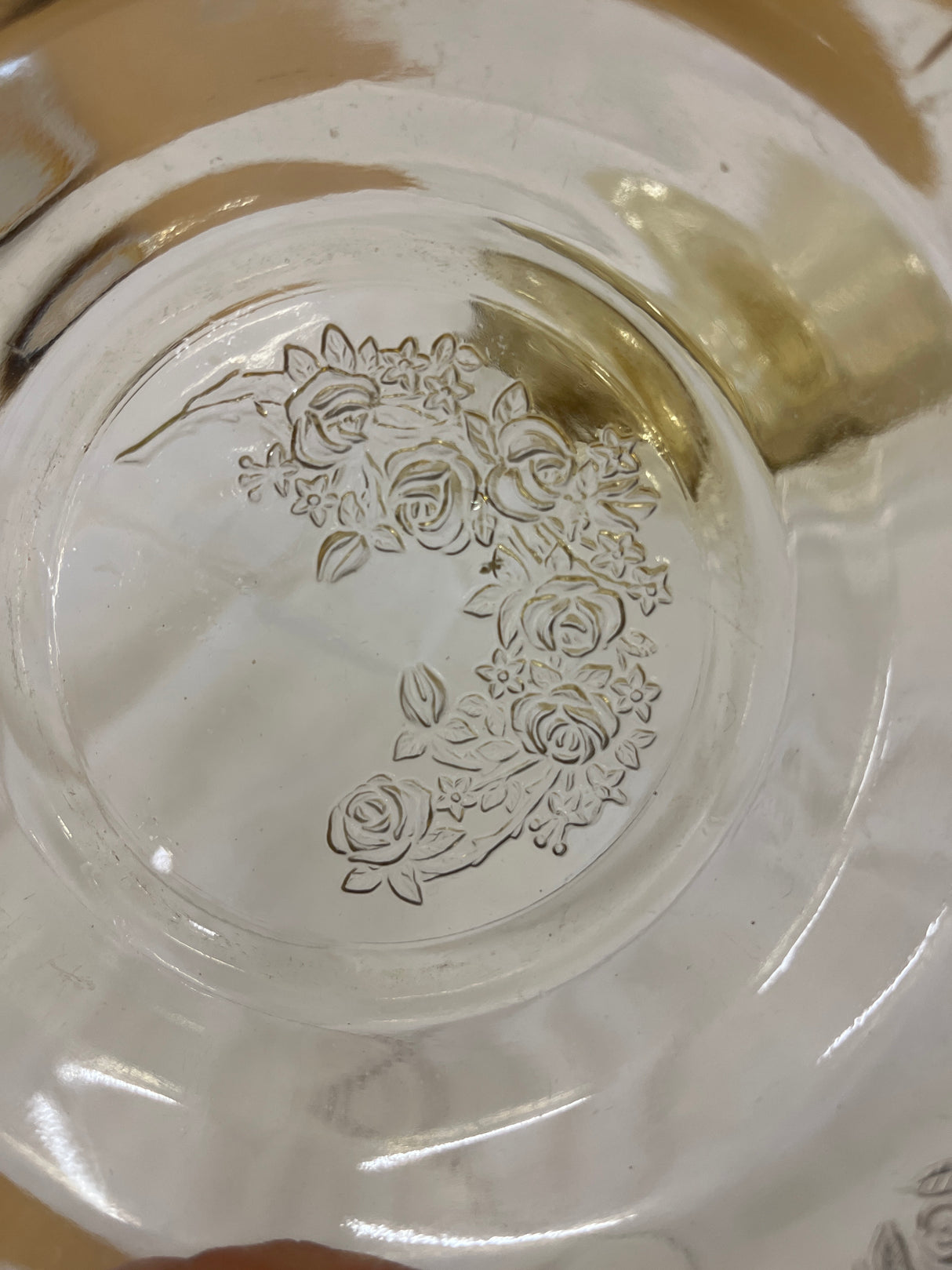 1930s Federal Glass Amber Sharon / Cabbage Rose fruit bowl with intricate embossed floral details, showcasing its fine condition and light yellow tint.