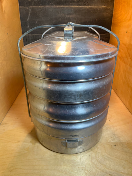 Stackable 5-tier food storage container - vintage aluminum Buckeye by Mardigian Corp., featuring interlocking bowls with a lid and handle for easy transport and meal organization.