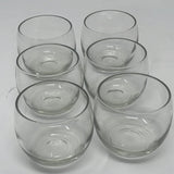 Bitty bubble glass drinking tumblers - set of 6: Close-up of various glassware on a white surface.