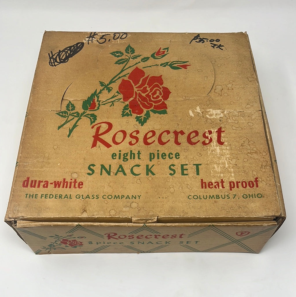 Vintage Federal Glass Co. Rosecrest snack set: white milk glass teacups and saucers adorned with red roses, housed in a logo-branded box.