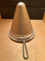 Cone sieve strainer with wide base - aluminum unknown brand; vintage cone-shaped metal sieve with sturdy handle, ideal for pressing sauces and preparing large batches.