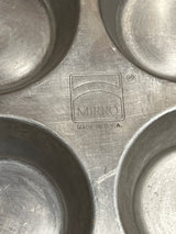 Mirro USA aluminum muffin cupcake pan with 6 2.5D holes, stamped logo and “Made in U.S.A.,” showcasing vintage charm and durability for baking.
