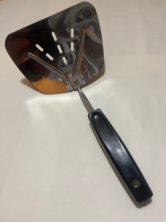 Foley Stainless Steel Wide Slotted Turner Lifter MPLS Curved Spatula with a sturdy, angled stainless-steel head and black plastic handle, ideal for flipping and lifting foods.