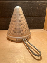 Cone sieve strainer - aluminum unknown brand; a sturdy, vintage metal kitchen tool with a perforated cone shape and looped handle, ideal for canning and preserving.