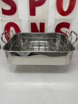 Martha Stewart for Macy's Collection stainless steel roasting pan with rack, ideal for holiday feasts, shown with a sturdy wire rack inside the pan.