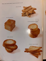 Martha Stewart’s Hors D’oeuvres cookbook page displays six canape carriers: Grilled Stars, Toasted Breadbox, Brioche Rounds, Crostini, and Toast Points.