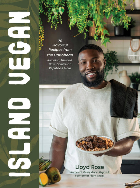 Cover of Island Vegan: 75 Caribbean Recipes From Jamaica & More by Lloyd Rose, featuring him in a kitchen with a plant-based dish, fruits, and greenery.