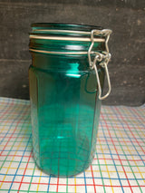 Food storage container with airtight locking lid - vintage faceted green glass