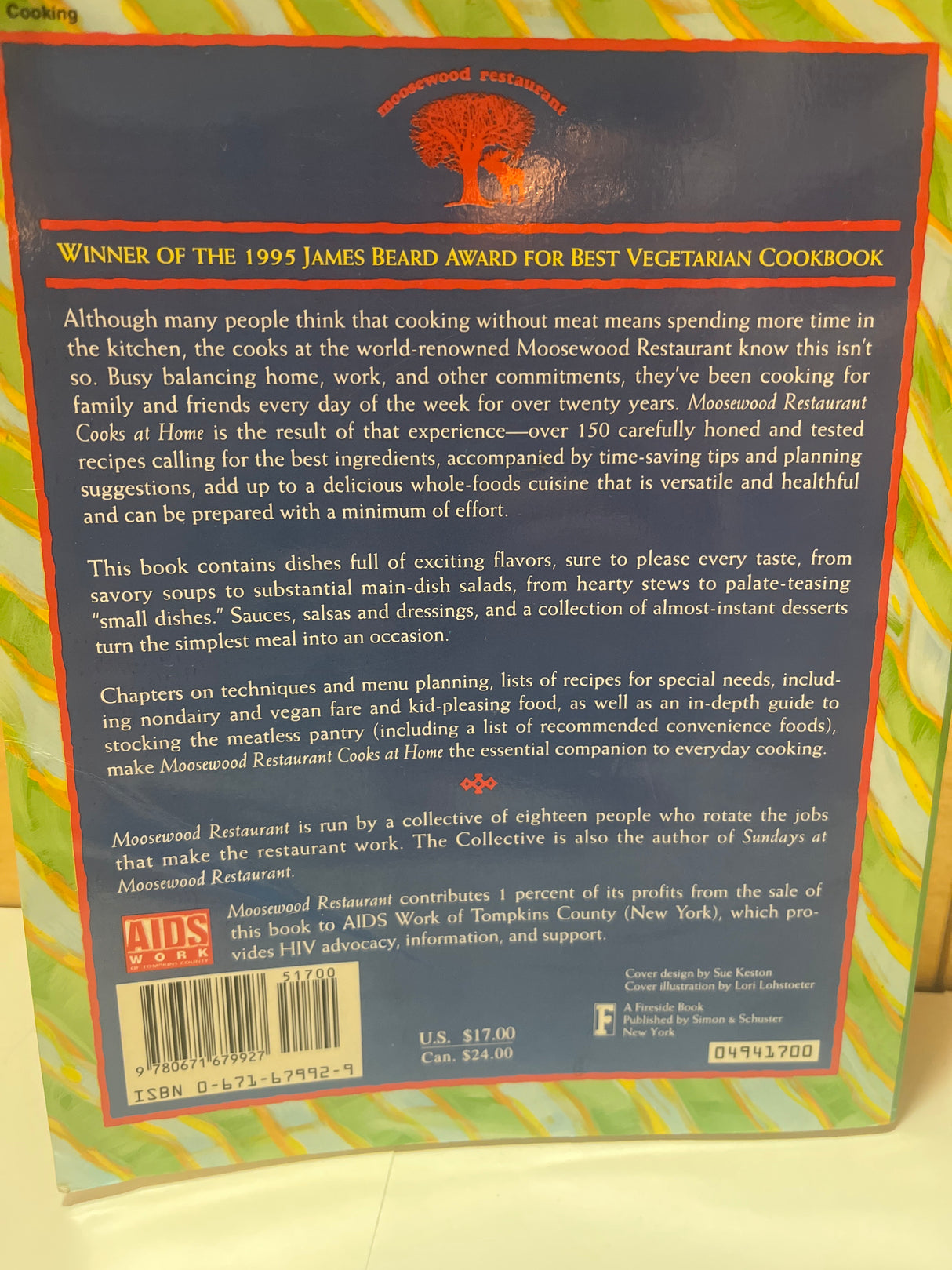 Back cover of “Moosewood Restaurant Cooks at Home,” highlighting award-winning vegetarian recipes, time-saving tips, and charitable donations, with ISBN, price, and publisher details visible.