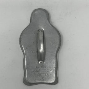 Mid century metal cookie cutters featuring holiday and celestial shapes, some with large handles for easy grip, including rare 1930s Pillsbury's Comicooky Cutter.