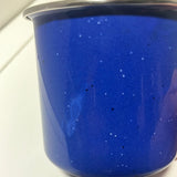 Blue enamel coffee mug with silver and black lids, slight indentation on one side. From Spoons Kitchen Exchange.