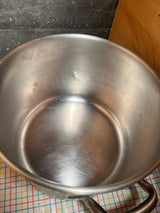 Large stock pot heavy duty (~28L) stainless steel with welded handles on a grid-patterned surface, ideal for high-volume cooking, NSF-Certified.