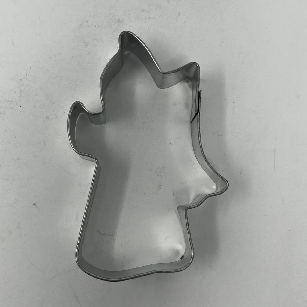 Mid century metal cookie cutters: Person-shaped cutter with large handle, celestial and holiday shapes available.