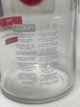 Bodum Kenya single-serve French press coffee maker in a glass jar with visible text, showcasing a unique design for brewing a rich, flavorful cup.