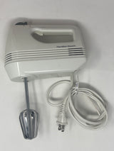 Hamilton Beach 5-speed handheld mixer with wire, ideal for mixing cakes and whipped cream. Features detachable parts for easy cleaning and storage.