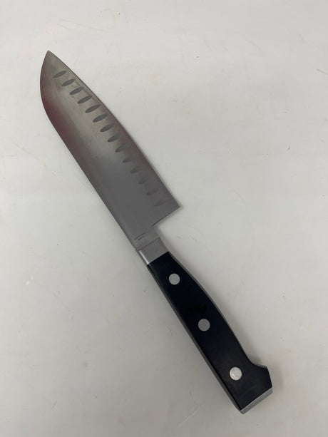 Simply Calphalon 7” Santoku knife, ideal for chopping crispy produce and fresh herbs, featuring a broad blade suitable for precise slicing tasks.