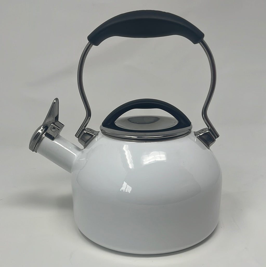 A white tea kettle with a black handle, showcasing a close-up of the kettle's design. Kitchenware, pot, and stovetop kettle.