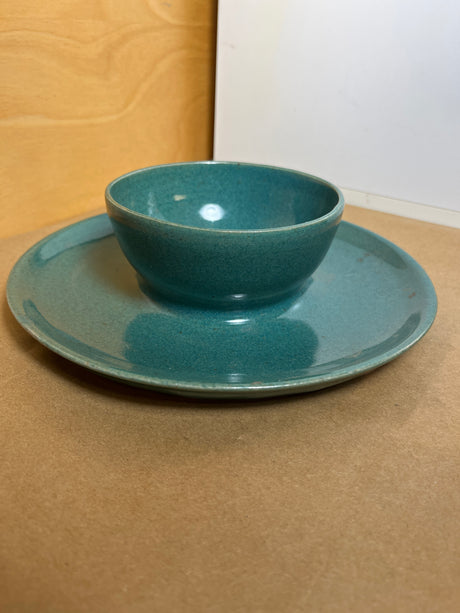 McEvoy ceramic dip dish with teal glaze, featuring a small bowl centered on a matching shallow plate, perfect for serving dips and snacks elegantly.