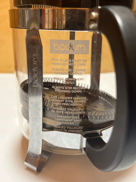 Bodum 4-cup French press, ideal for small batches of strong coffee, features a sleek design with a clear container and sturdy handle.