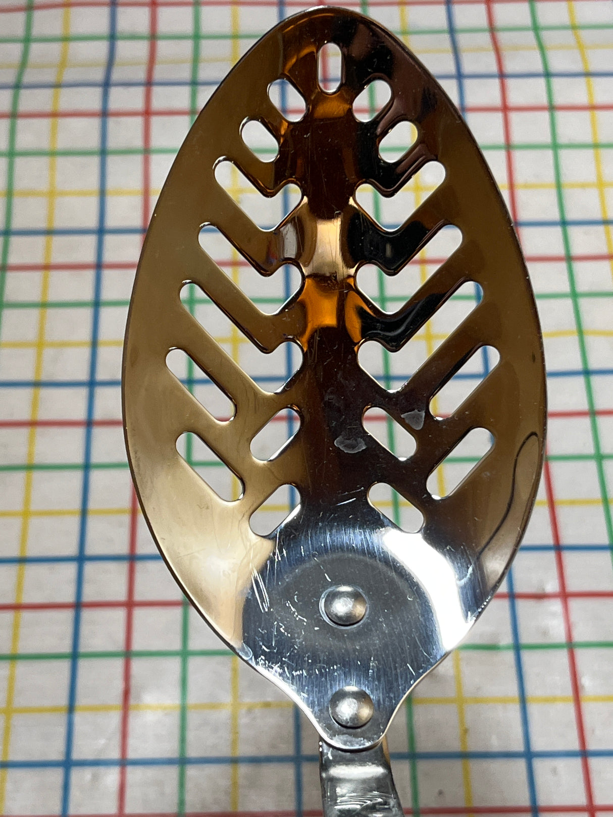 Slotted spoon - stainless steel with dark brown marbled resin handle - Cutco