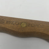 A wooden handle with a screw holds the EKCO Forge Utility 6 Inch Knife, ideal for precise slicing of meat, fruit, and veggies.