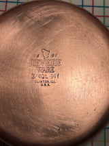 3/4-qt saucepan with copper bottom - vintage Revere Ware stainless steel; features visible factory stamp, copper base, and Bakelite handle with hanging ring.