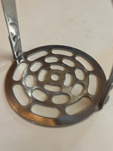 Potato masher with black handle, features an easy-grip design and hanging notch, combining vintage charm with practical utility for effective mashing.