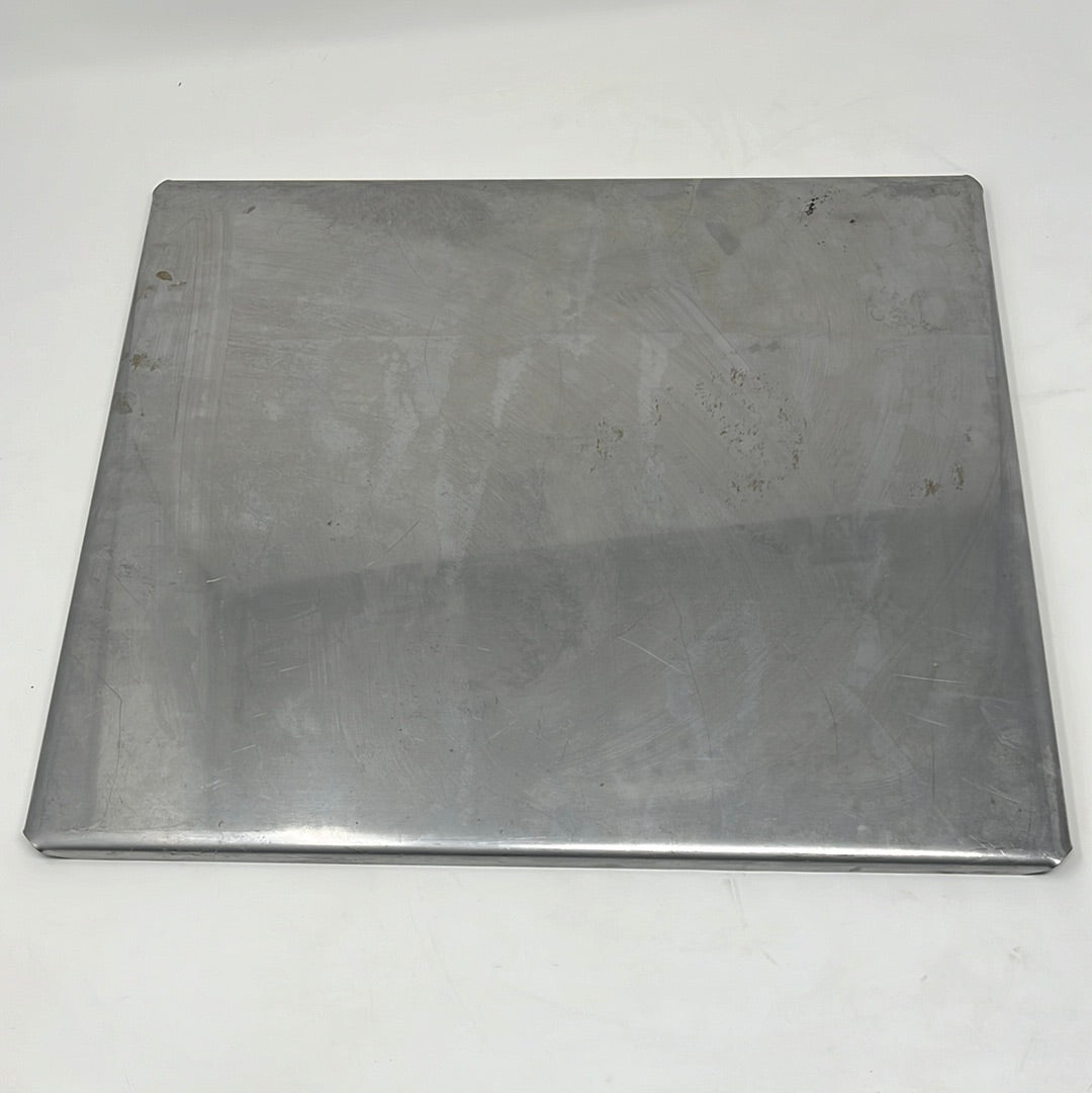 A stainless steel heavy-duty pan, showing a metal plate with scratches on a white surface, suitable for baking and oven use.