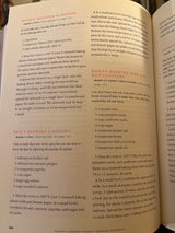 Cookbook page from Martha Stewart’s Hors d’Oeuvres Handbook, featuring recipes for Honey-Roasted Almonds, Spicy Paprika Cashews, and Honey-Roasted Seed and Nut Clusters with detailed instructions.