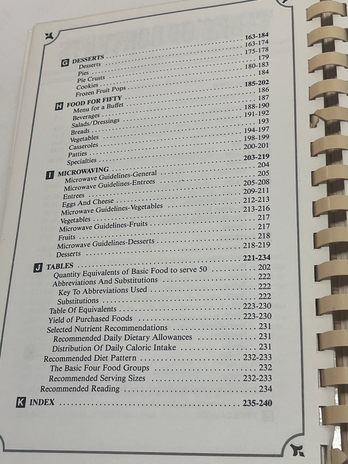RARE An Apple A Day Volume Two – Vegetarian Cookery by Doctors' Wives, spiral-bound cookbook contents include desserts, foods for fifty, microwaving, tables, and index sections.