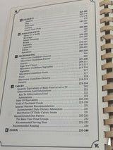 RARE An Apple A Day Volume Two – Vegetarian Cookery by Doctors' Wives, spiral-bound cookbook contents include desserts, foods for fifty, microwaving, tables, and index sections.